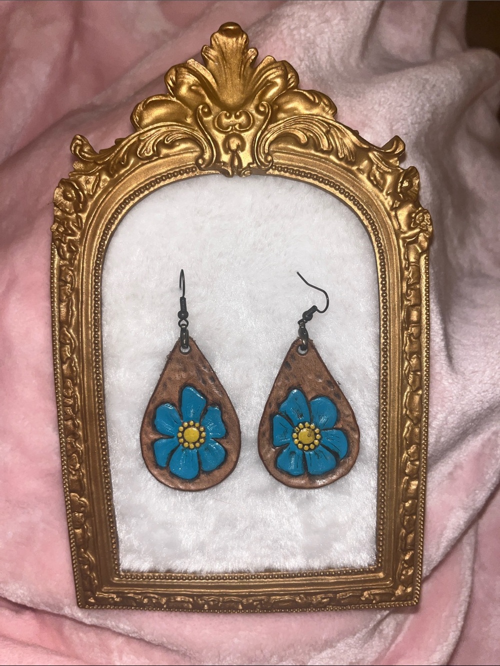 Handcrafted Teardrop Leather Earrings with Blue Flower Accent